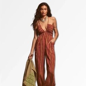 NWT FREE PEOPLE Size M SUNDAZE FOR SURFIN JUMPSUIT